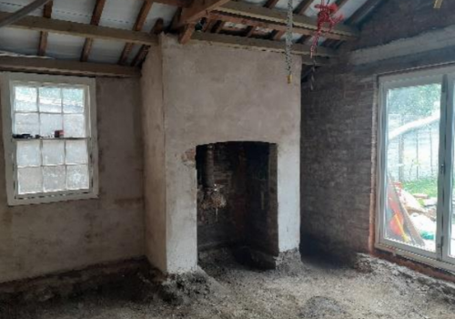 Concrete floor and cement render on walls removed